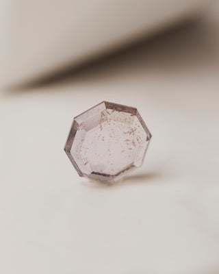 This 3.56 carat Rose hued tablet-cut Montana Sapphire is a hexagon shape