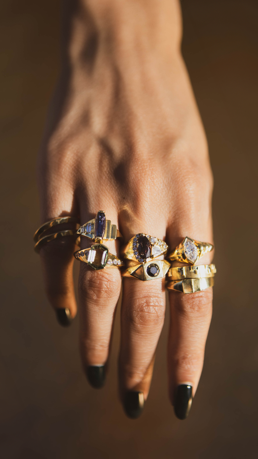 Art Deco gold rings on hand