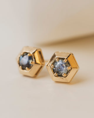 Round Montana Sapphires in 14K yellow gold hexagon setting