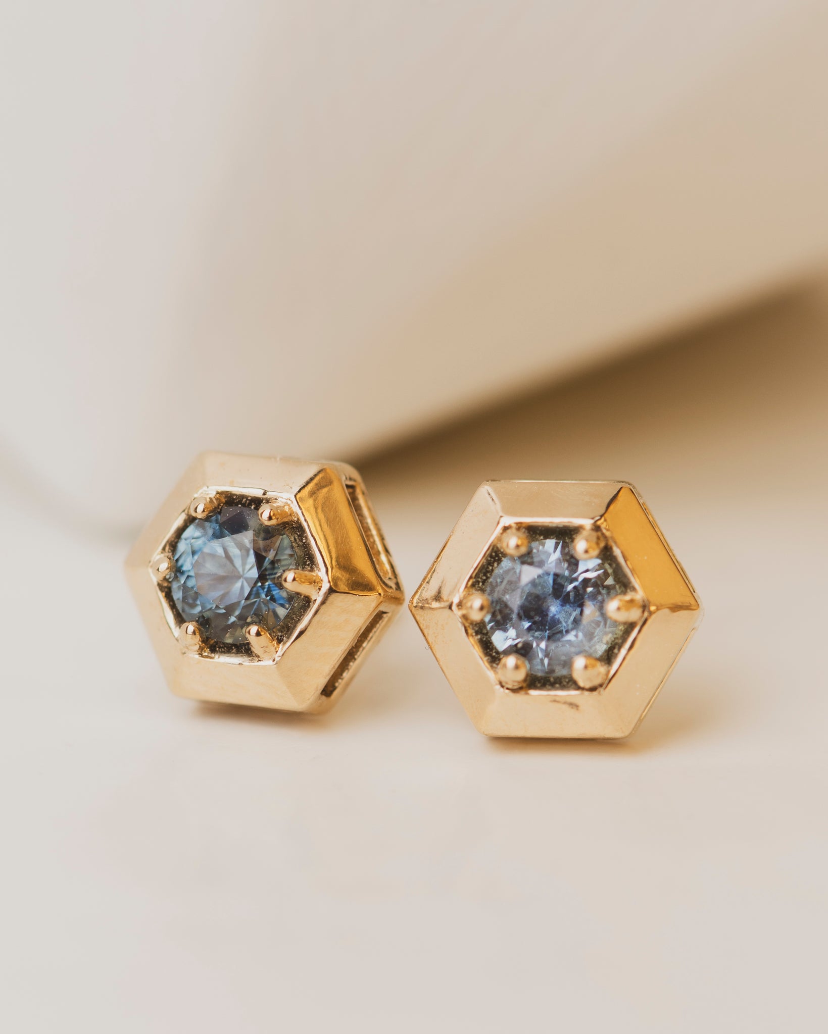 Round Montana Sapphires in 14K yellow gold hexagon setting