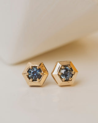 Round Montana Sapphires in 14K yellow gold hexagon setting