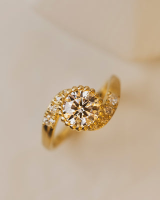 1.41 carat lab grown diamond engagement ring in rose vine bezel setting with accent diamonds in 18K yellow gold