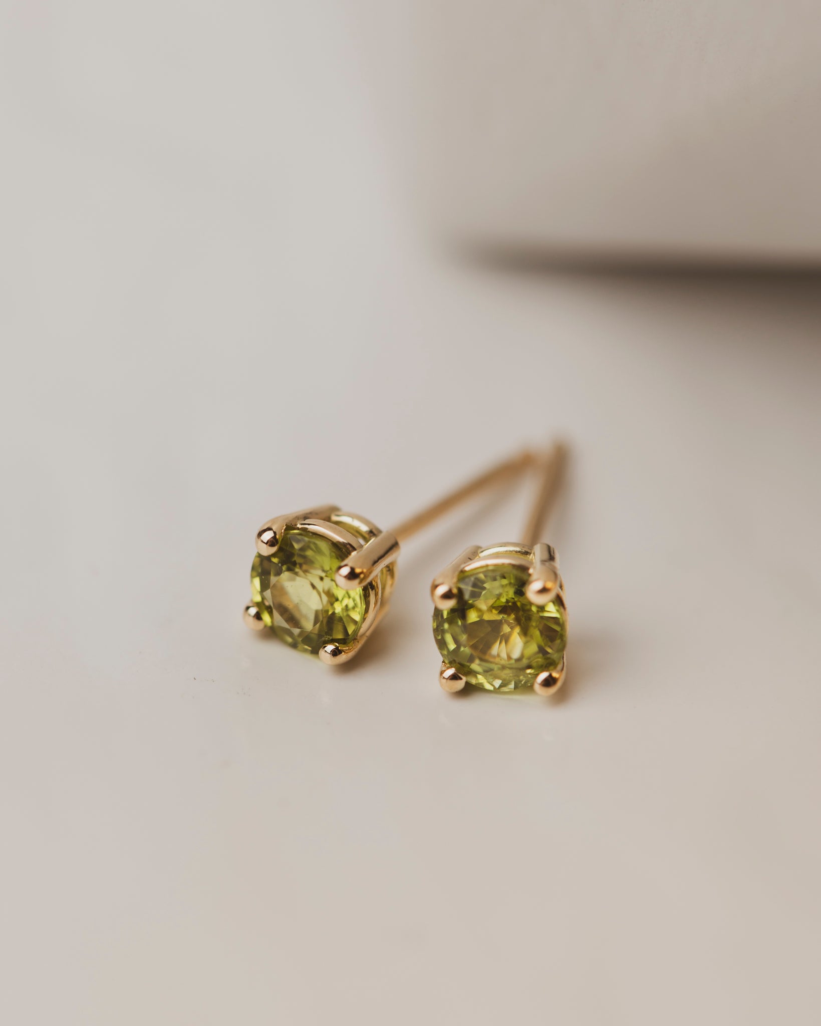 These bright peridot studs bring light and shine in 18K yellow gold. Peridot stones measure 4.5mm - total carat weight: 1.61ct.
