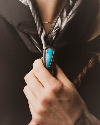 Drop of Ocean Santa Maria Turquoise and Diamond Ring in Sterling Silver worn as a scarf tie
