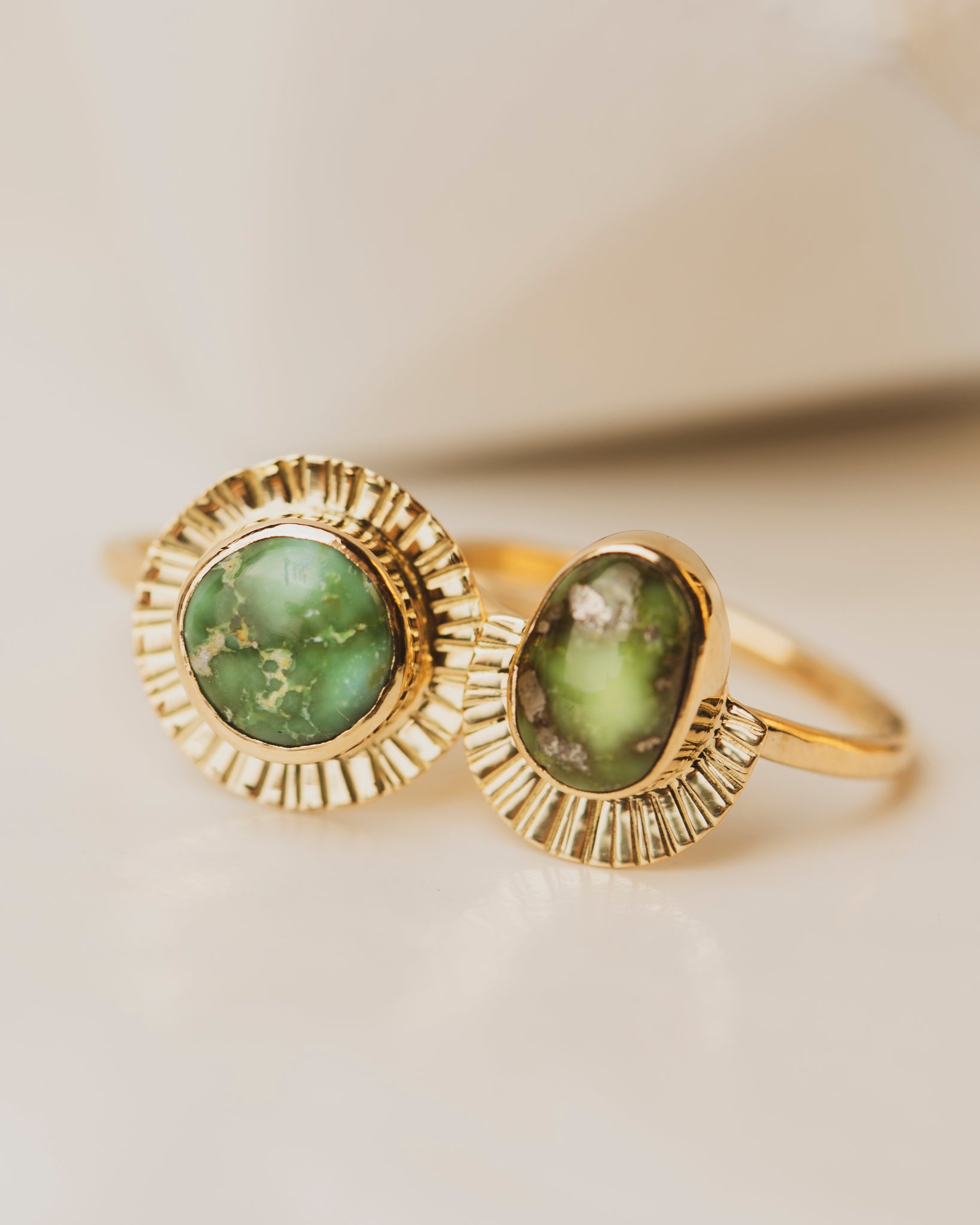 Round and Pear Sonoran Gold Turquoise bezel set in 18K yellow gold on full and half gold shield. One of a kind rings!