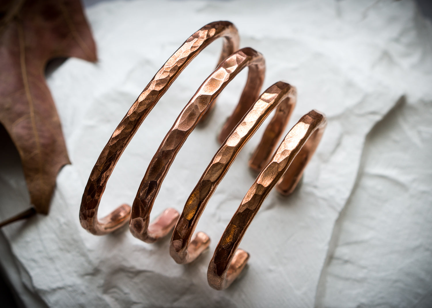 Hammered copper hand forged cuffs